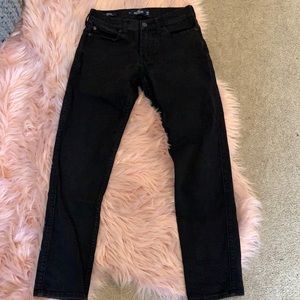 Men’s black pants.